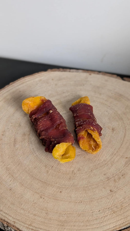 Duck wrapped mango chunks